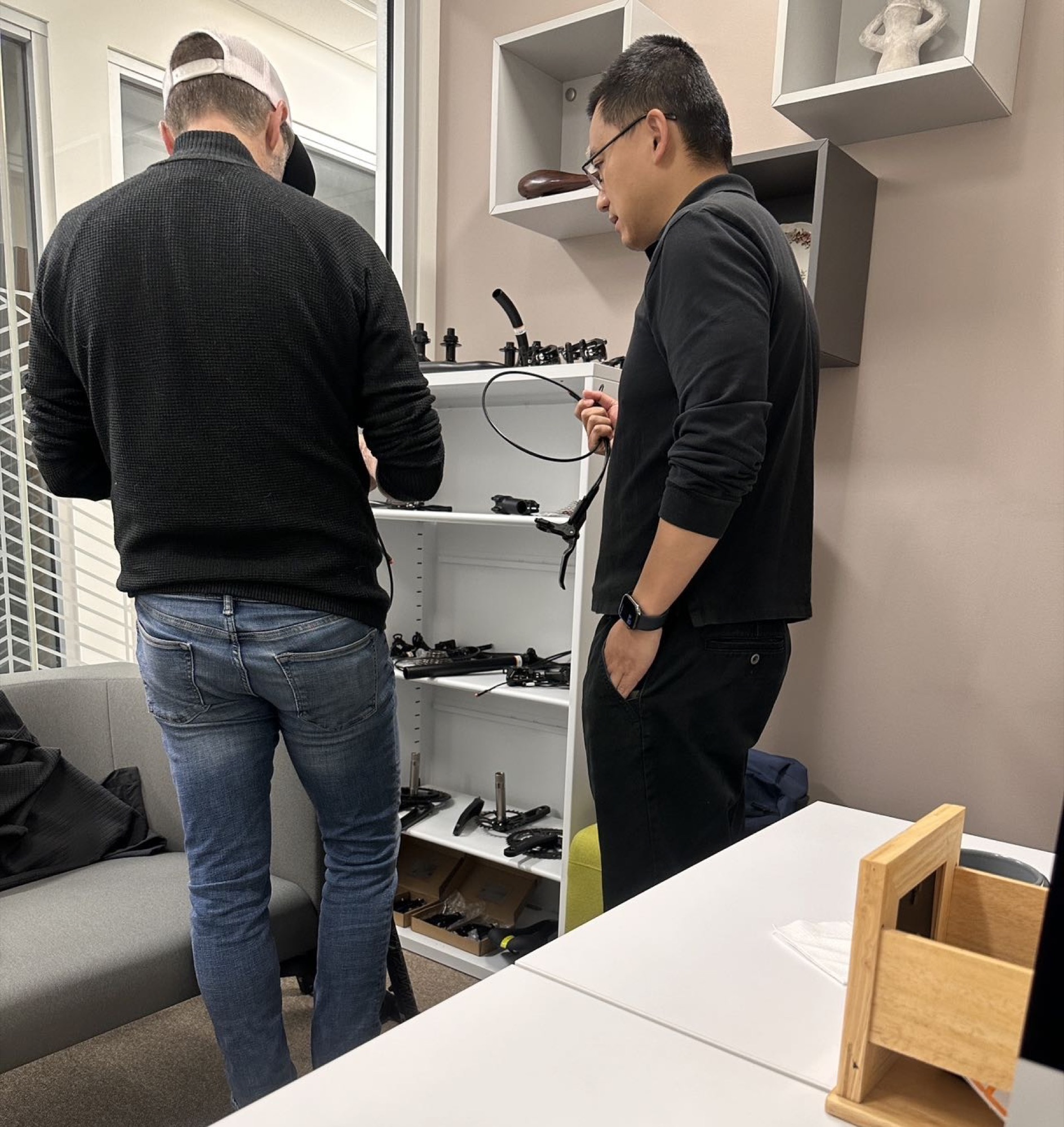 Ryan Link discussing bicycle components with a Canadian customer